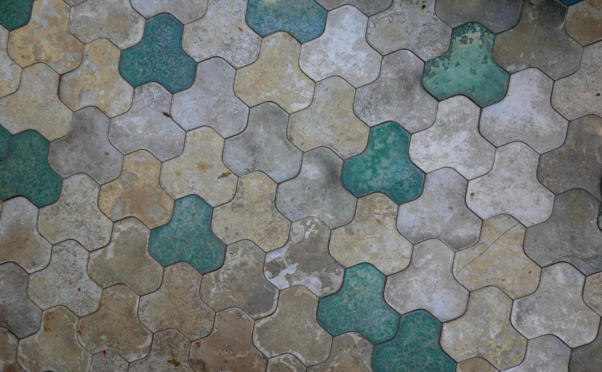 A rustic mosaic of hexagon tiles in earth tones, creating vibrant textures.